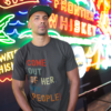 "OUT OF HER, MY PEOPLE!" – UNISEX HEAVY COTTON TEE by The Israelite Merchant™